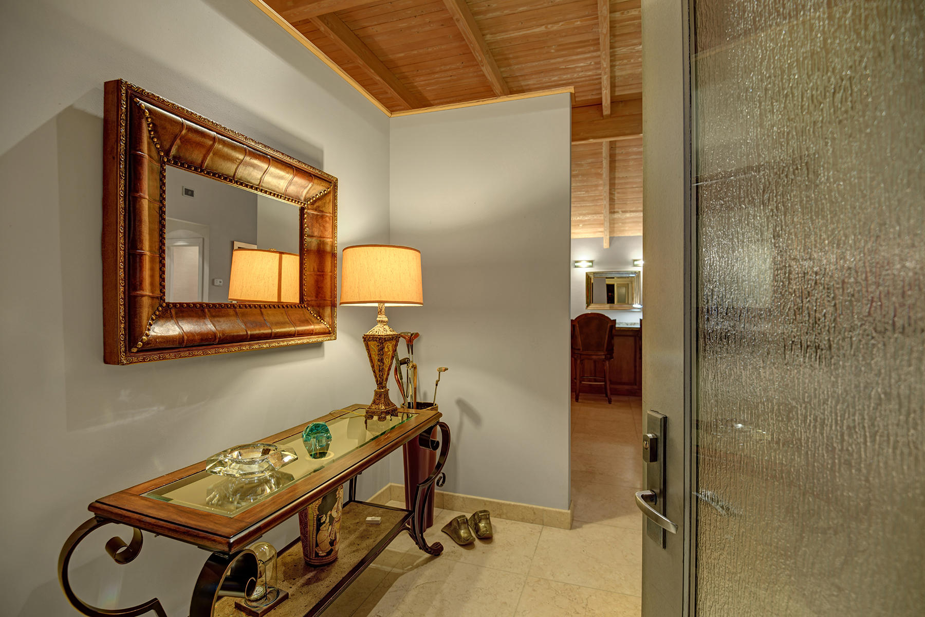4 Boothill Circle Rancho Mirage, CA 92270 - Photo 15 of 55 a bathroom with a toilet a sink and mirror