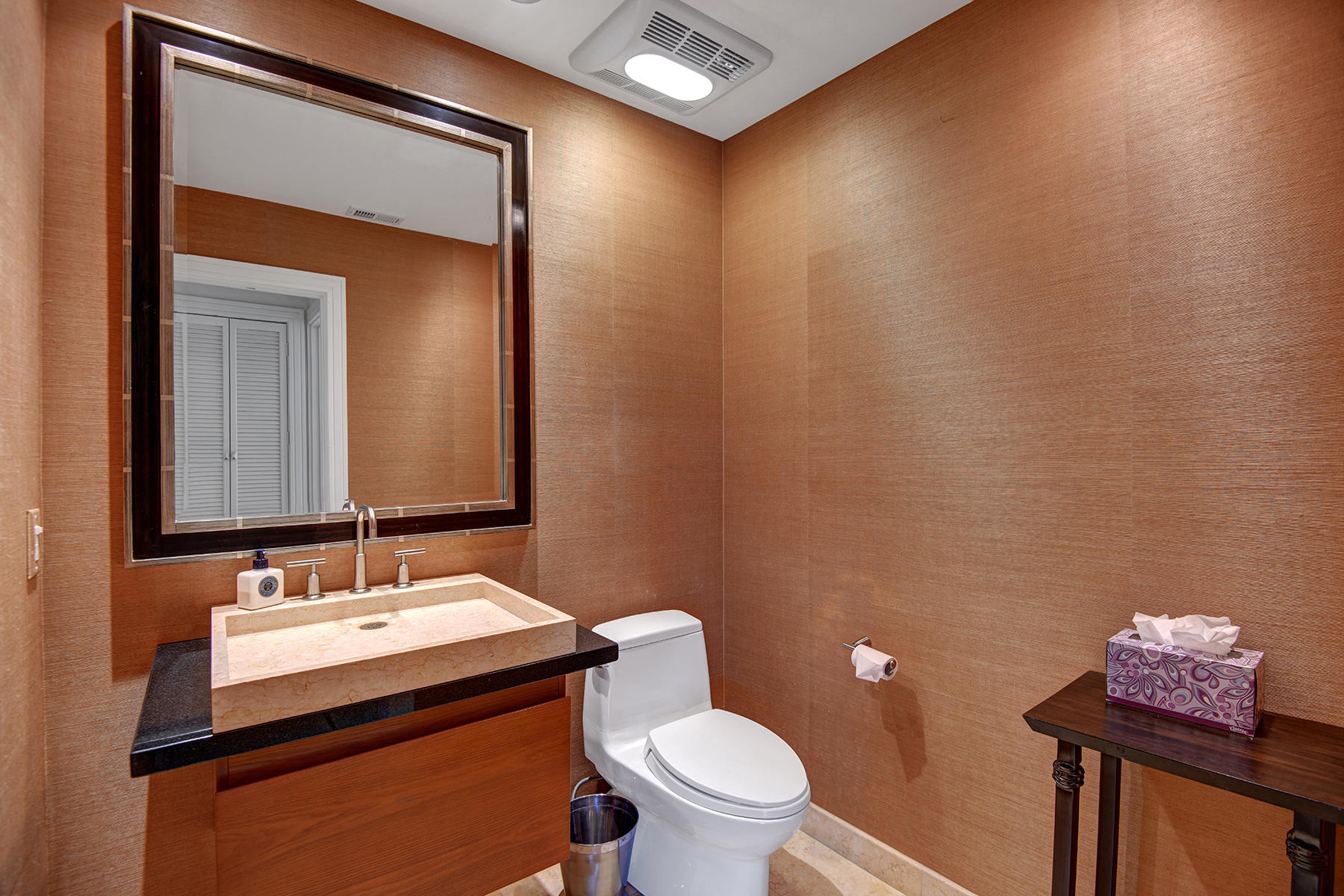 4 Boothill Circle Rancho Mirage, CA 92270 - Photo 18 of 55 a bathroom with a sink mirror vanity and toilet
