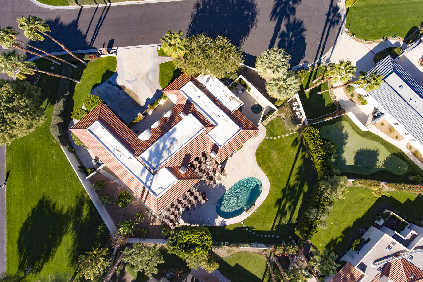 4 Boothill Circle Rancho Mirage, CA 92270 - Photo 3 of 55 an aerial view of a house with a garden