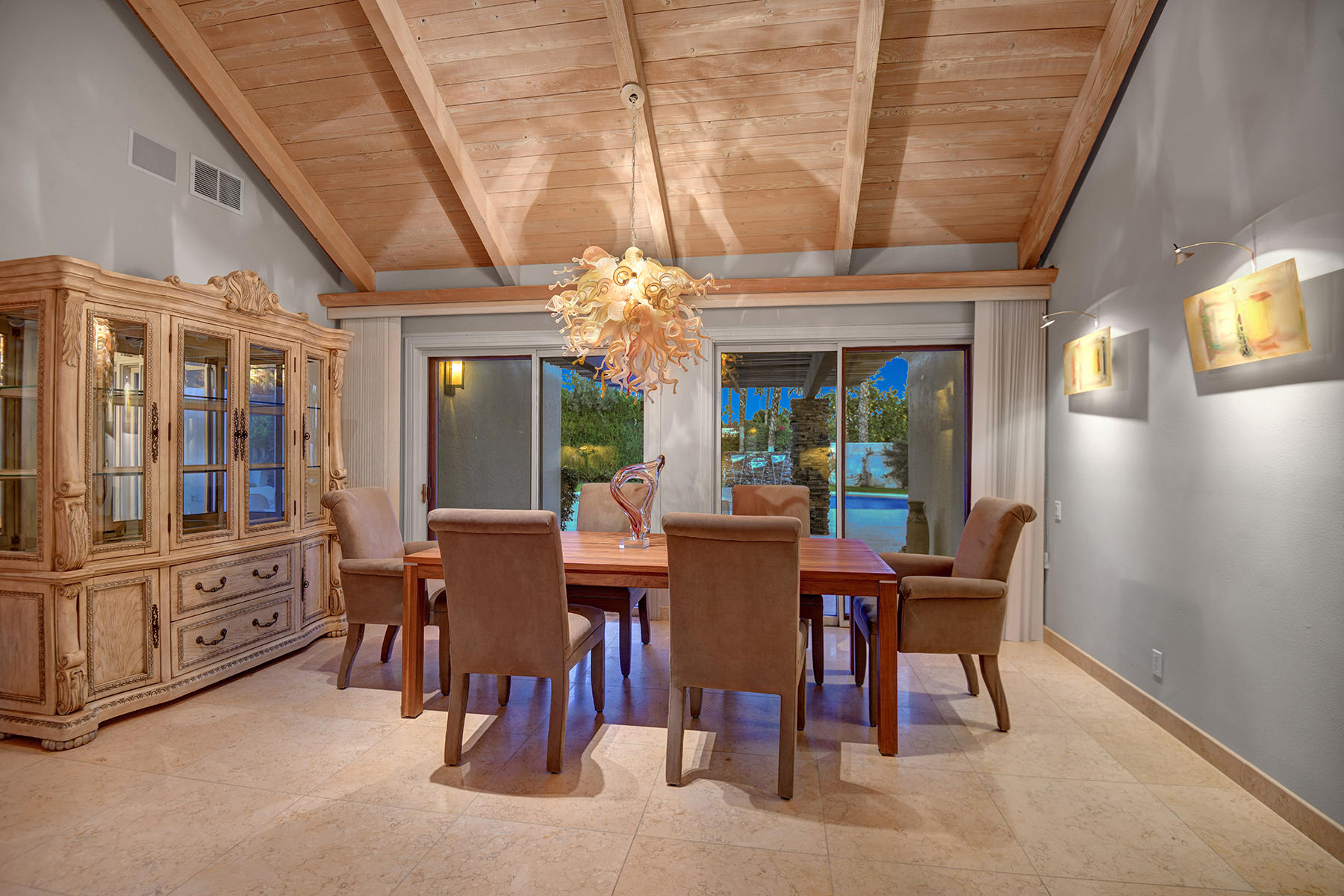 4 Boothill Circle Rancho Mirage, CA 92270 - Photo 24 of 55 a view of a dining room with furniture window and outside view