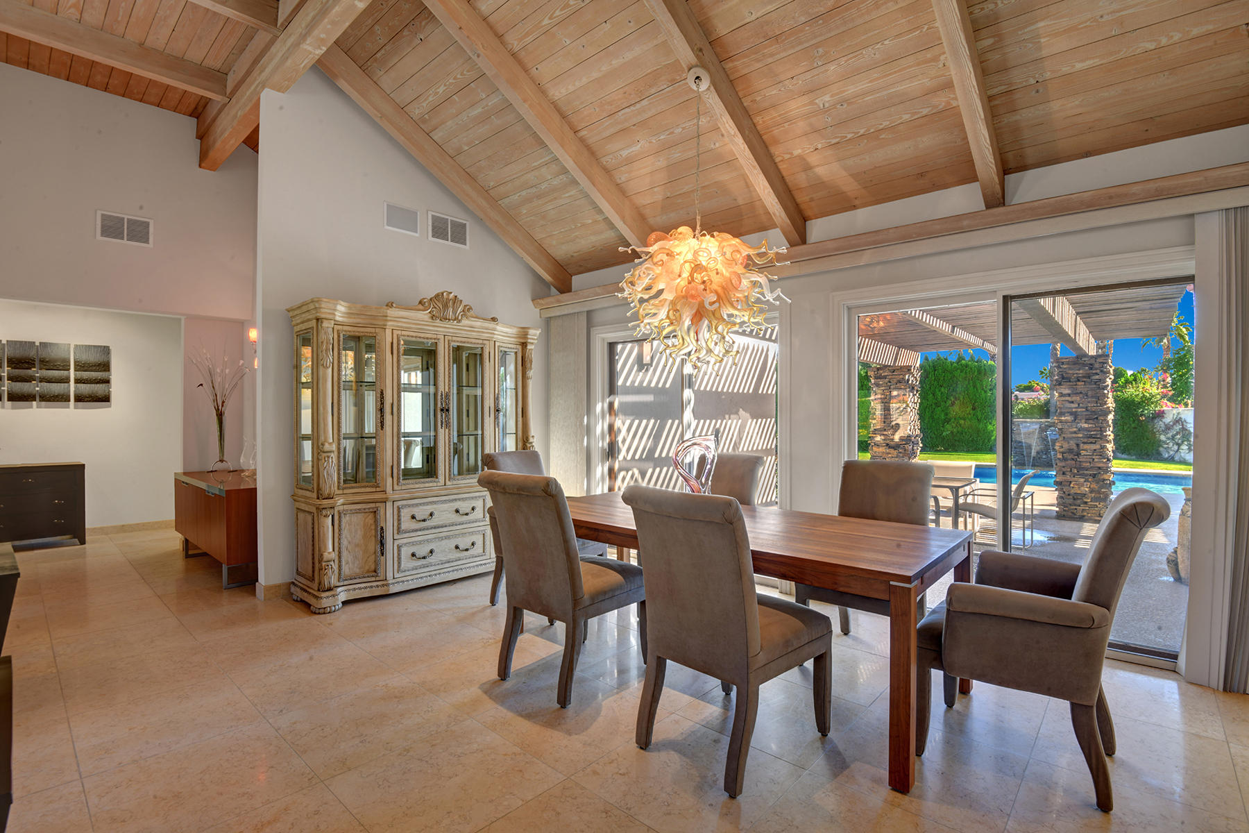 4 Boothill Circle Rancho Mirage, CA 92270 - Photo 25 of 55 a view of a dining room with furniture window and outside view