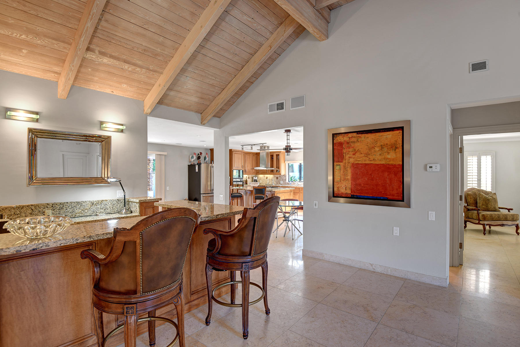 4 Boothill Circle Rancho Mirage, CA 92270 - Photo 38 of 55 a dining room with furniture and window
