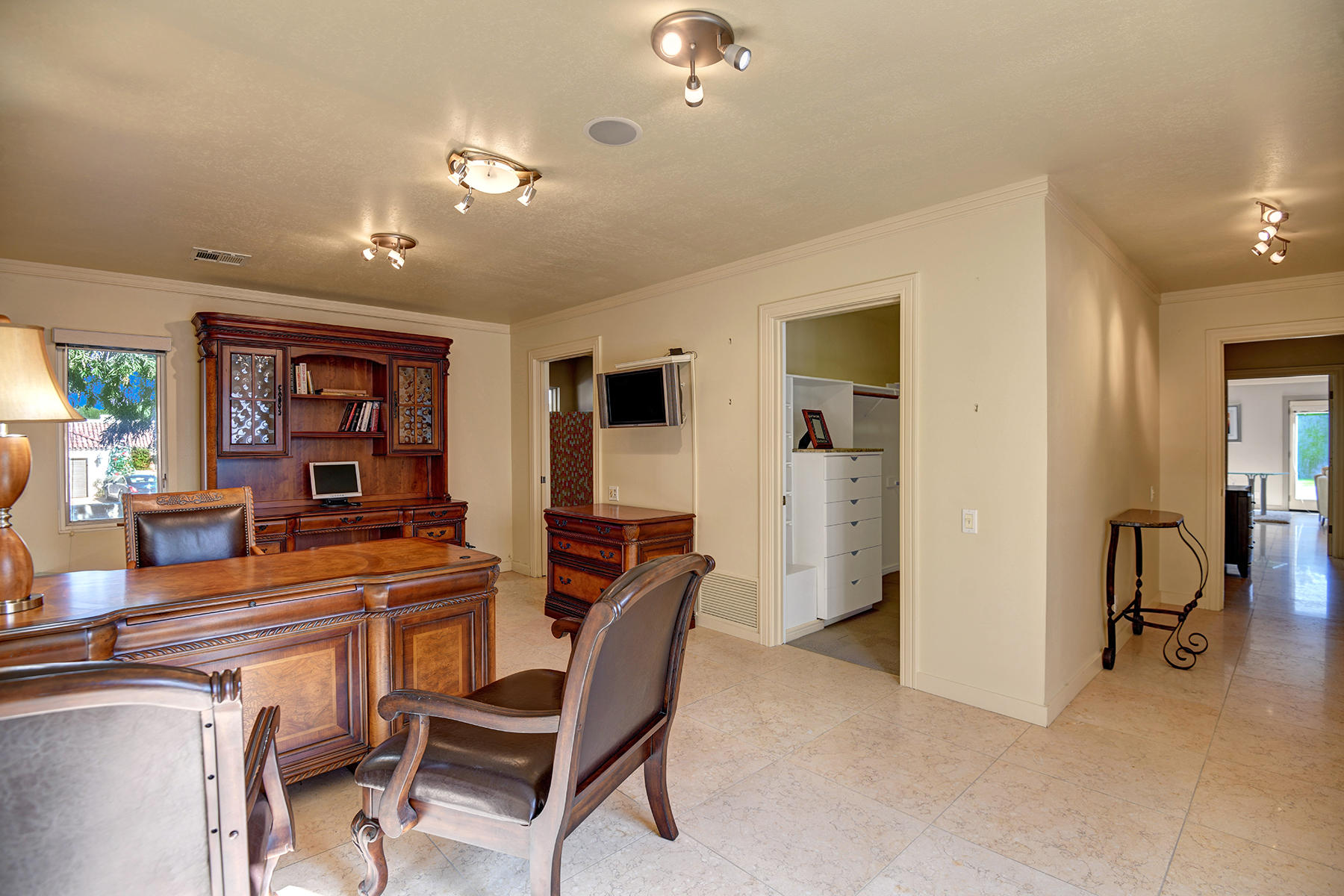 4 Boothill Circle Rancho Mirage, CA 92270 - Photo 52 of 55 a dining room with furniture and window