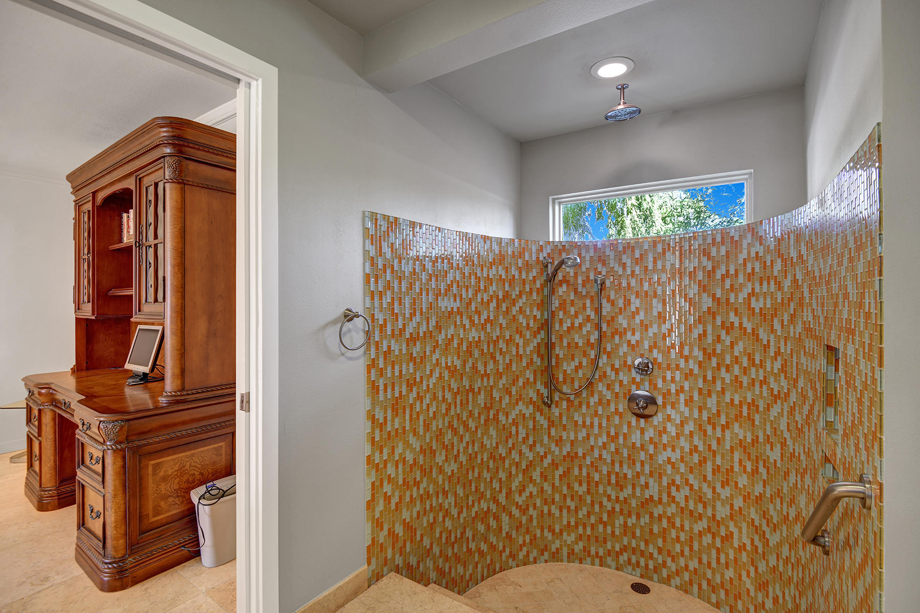 4 Boothill Circle Rancho Mirage, CA 92270 - Photo 54 of 55 a bathroom with a toilet and a shower curtain