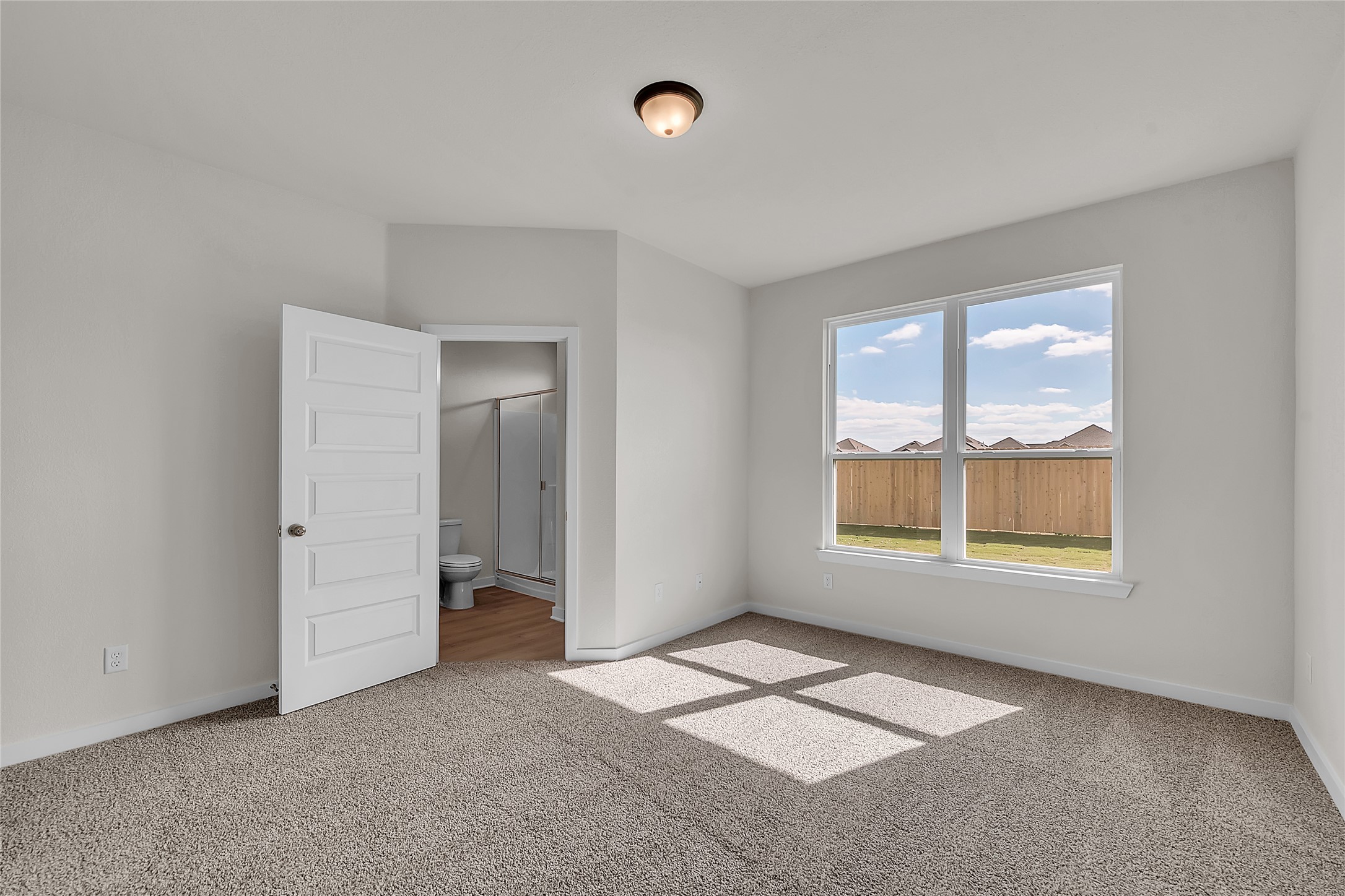 308 Boatright Boulevard Jarrell, TX 76537 - Photo 12 of 31 Unfurnished room featuring light colored carpet