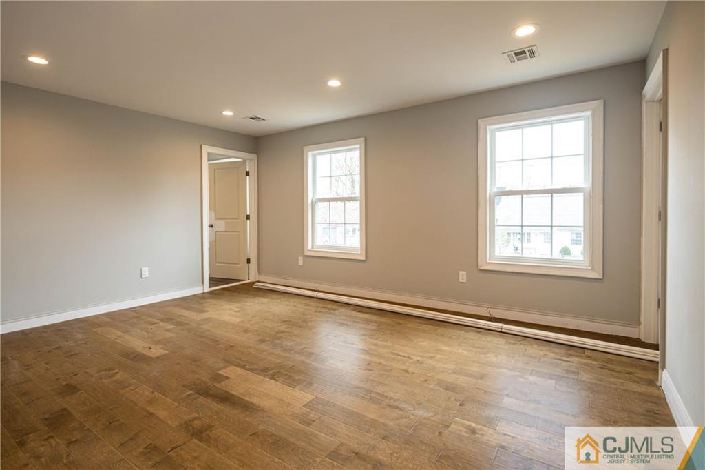 87 Ashley Road Edison, NJ 08817 - Photo 16 of 35 a view of an empty room with a window