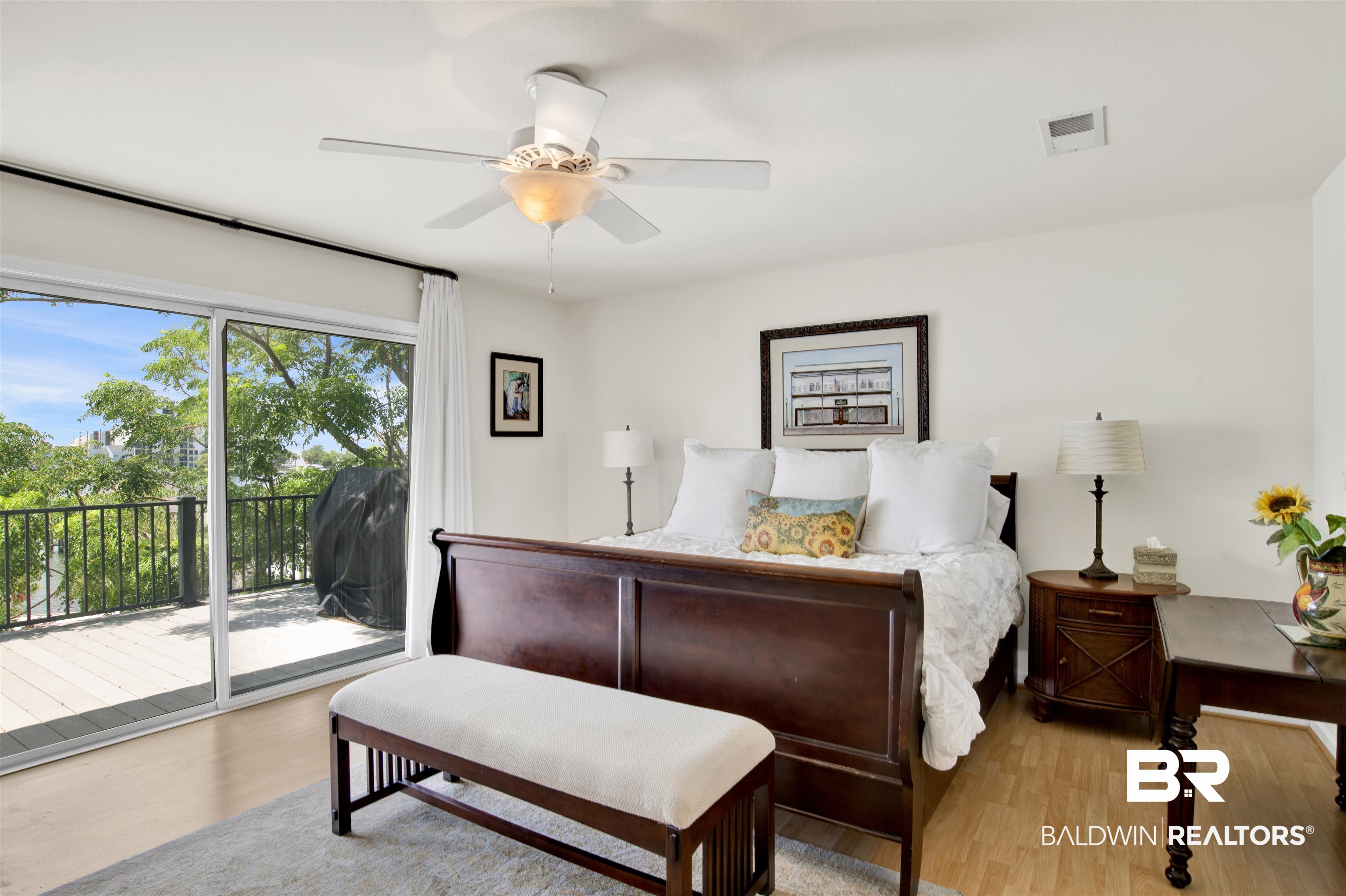 30538 River Road Orange Beach, AL 36561 - Photo 30 of 78 Bedroom featuring access to exterior, light wood-style floors, and a ceiling fan