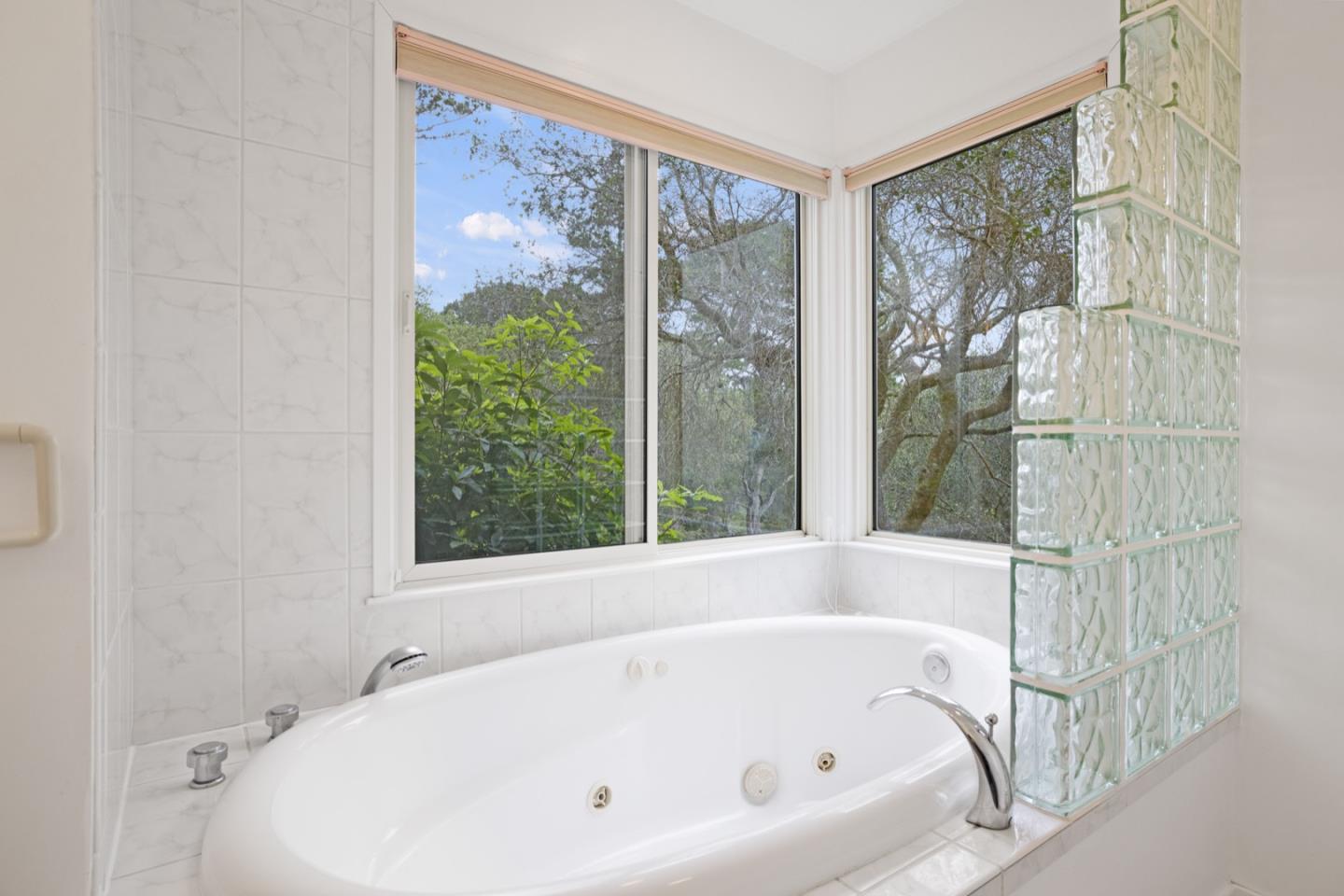 2 Cramden Drive Monterey, CA 93940 - Photo 25 of 50 a white bath tub sitting next to a window