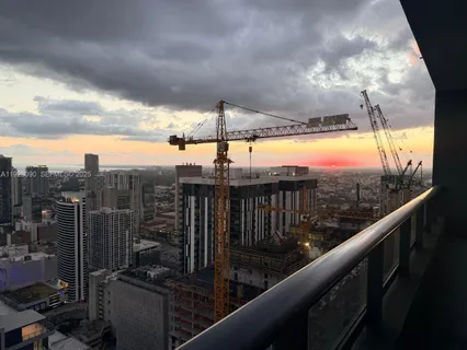 a view of a balcony with city view