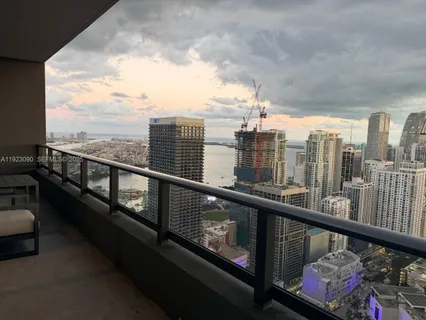 a view of a balcony with city view
