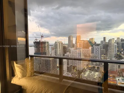 a view of a balcony with city