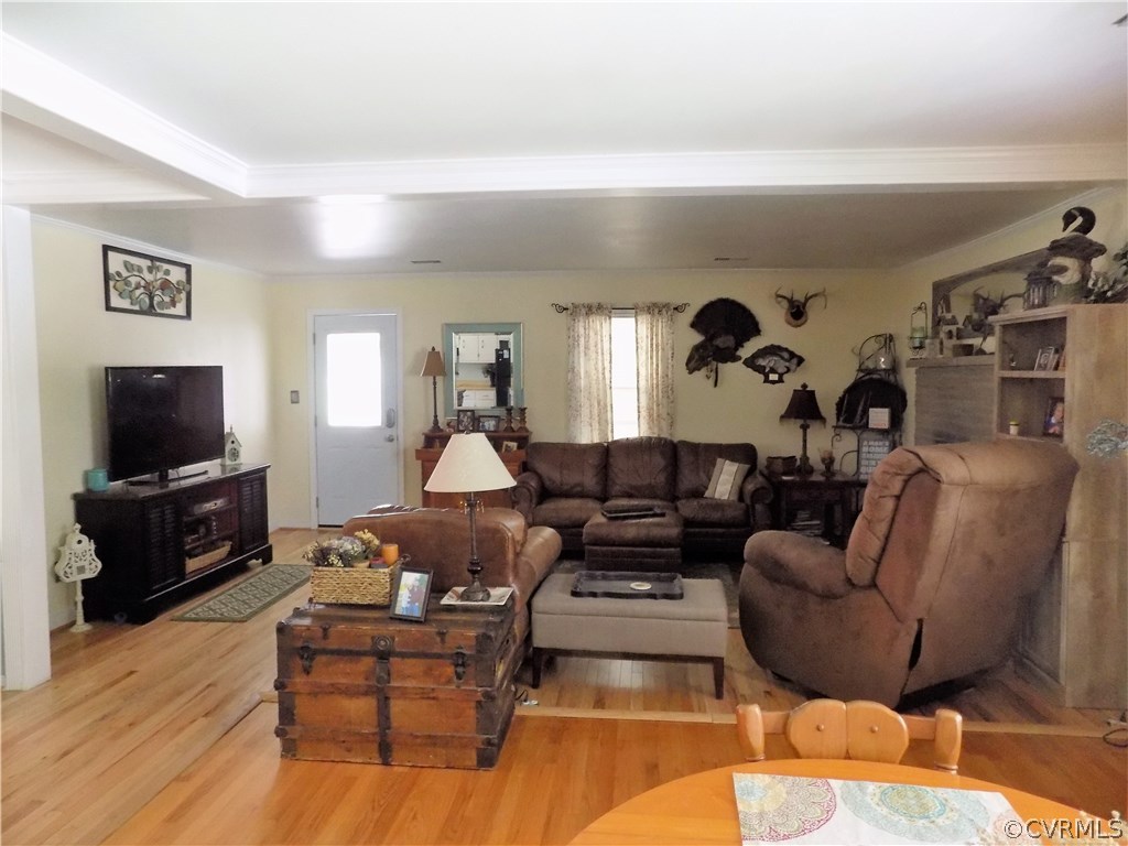 3131 Mountclair Road Chester, VA 23831 - Photo 7 of 23 a living room with furniture and a flat screen tv