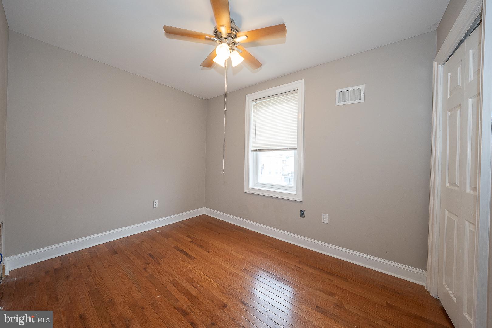 216 Ridley Avenue Sharon Hill, PA 19079 - Photo 18 of 29 Bright and airy room with hardwood floors.