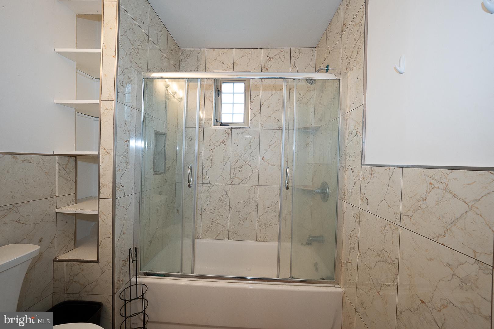 216 Ridley Avenue Sharon Hill, PA 19079 - Photo 20 of 29 Modern bathroom with elegant tiles.