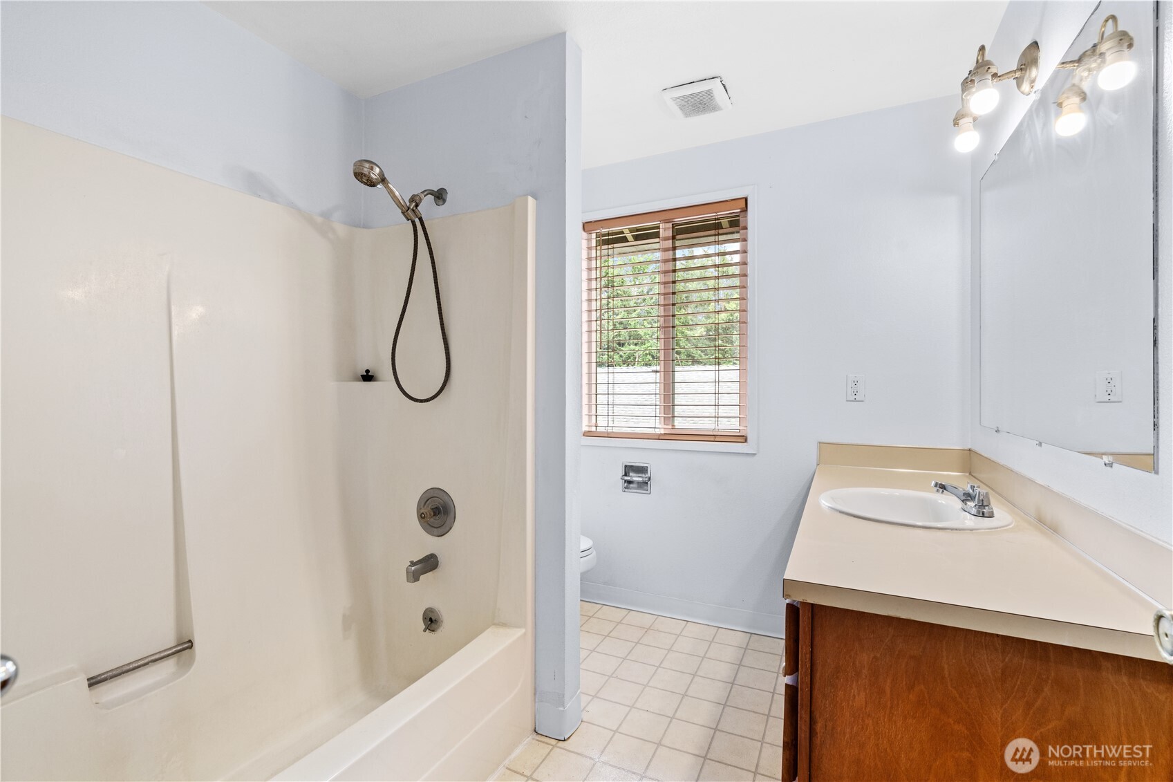 5304 Northeast 84th Loop, Unit 16 Vancouver, WA 98662 - Photo 12 of 22 a bathroom with a bath tub and a shower