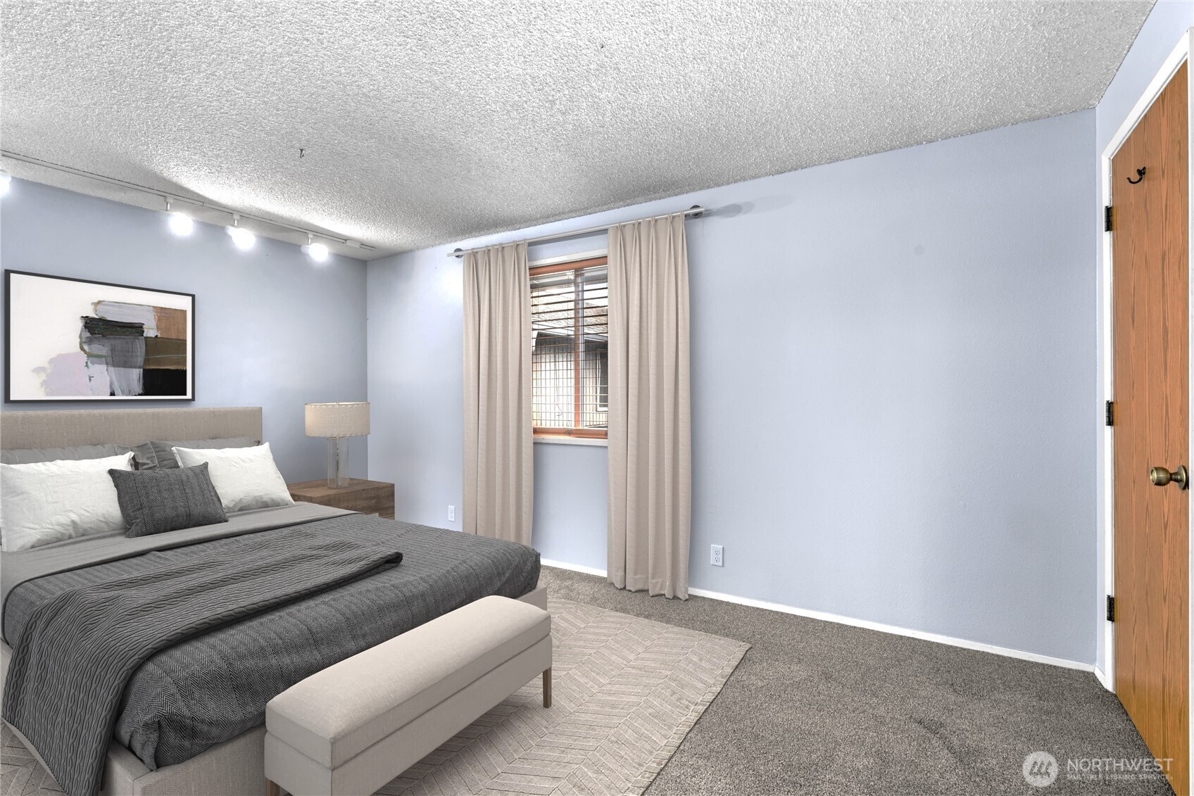 5304 Northeast 84th Loop, Unit 16 Vancouver, WA 98662 - Photo 13 of 22 a bedroom with a bed and a painting