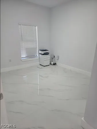 $2,000 | 821 Bell Boulevard, Lehigh Acres, FL 33974