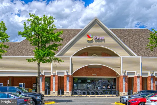 a sign that is on the side of a brick building