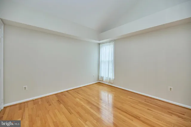 a kitchen with stainless steel appliances a refrigerator and a stove top oven