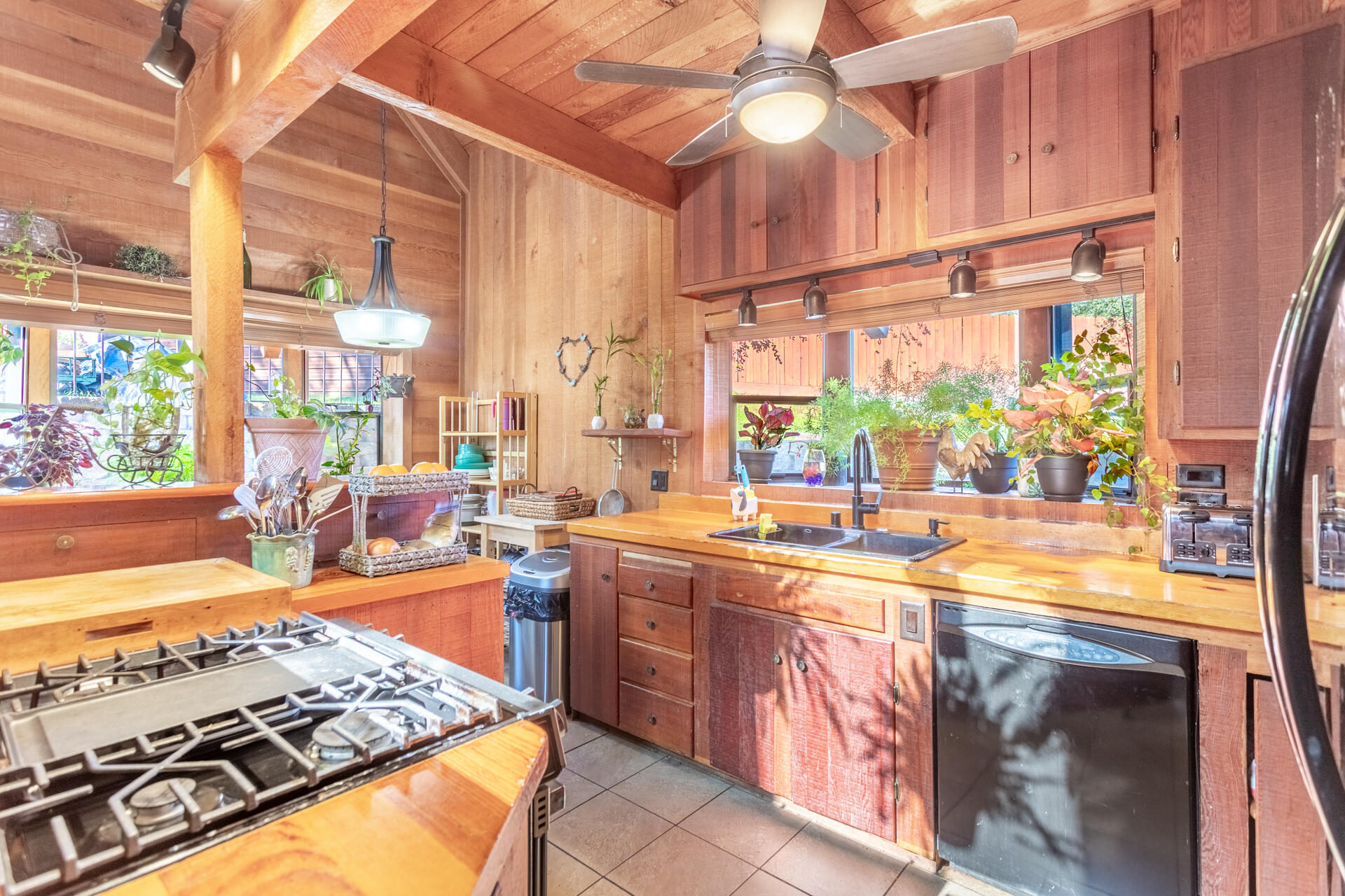 18376 Utility Avenue Anderson, CA 96007 - Photo 11 of 44 a kitchen with lots of counter top space and wooden floor