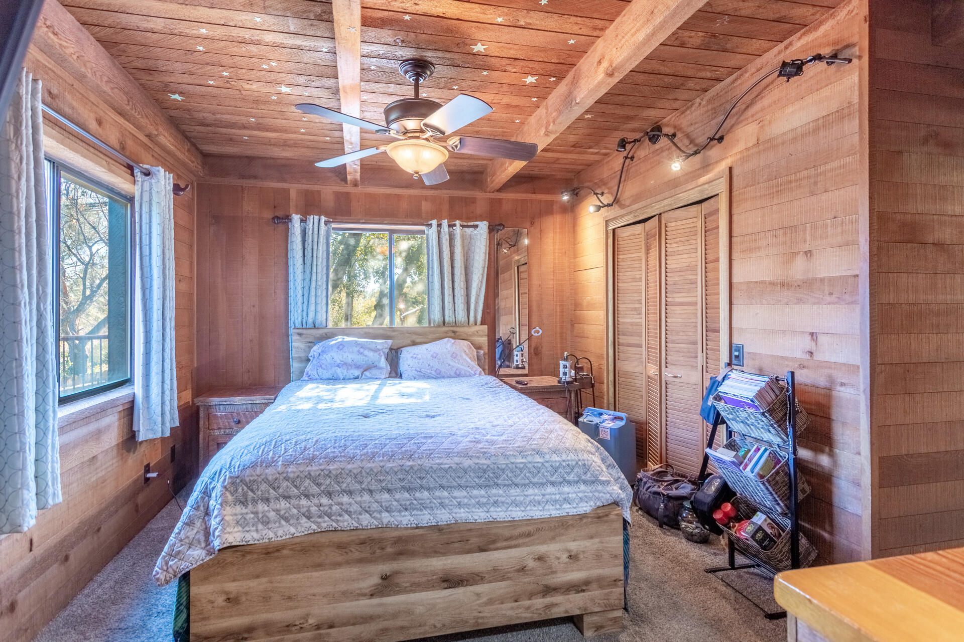 18376 Utility Avenue Anderson, CA 96007 - Photo 16 of 44 a bed sitting in a room next to a window