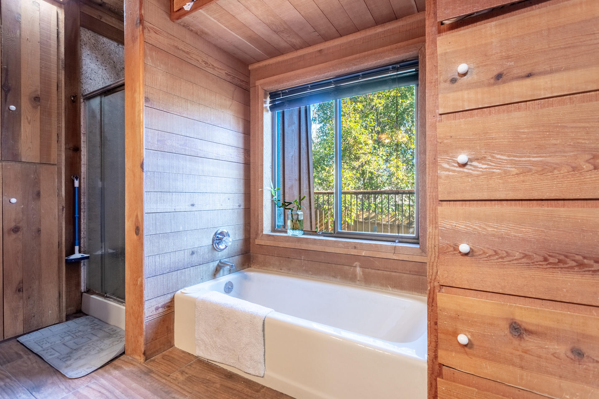 18376 Utility Avenue Anderson, CA 96007 - Photo 18 of 44 a bathroom with a tub and shower
