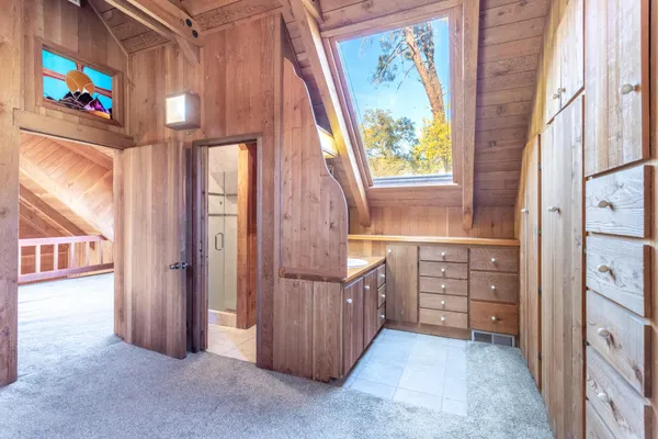 a bathroom with a sink and a window