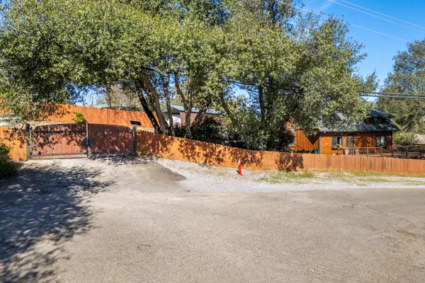 a view of a backyard of house