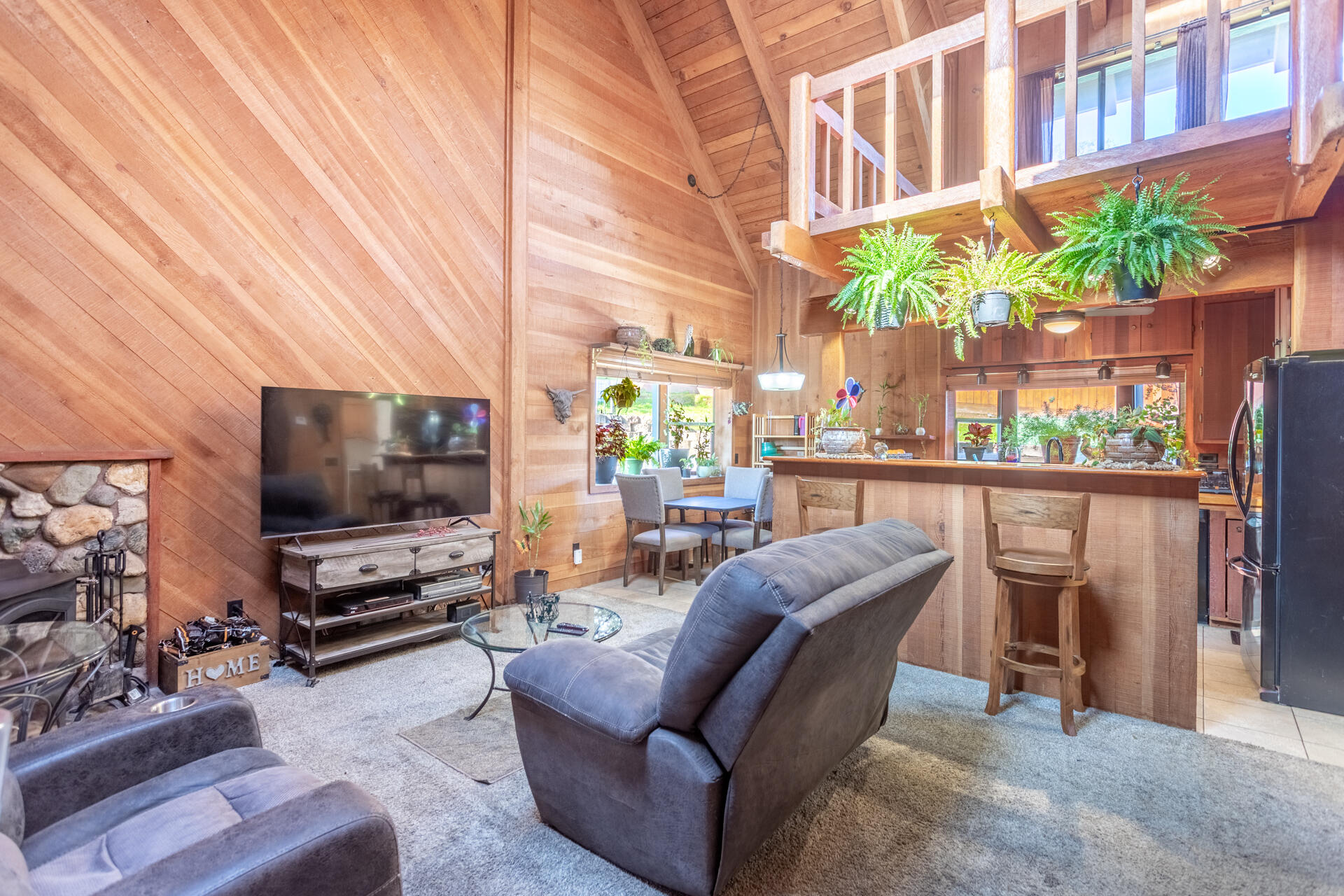 18376 Utility Avenue Anderson, CA 96007 - Photo 5 of 44 a view of a living room and a flat screen tv
