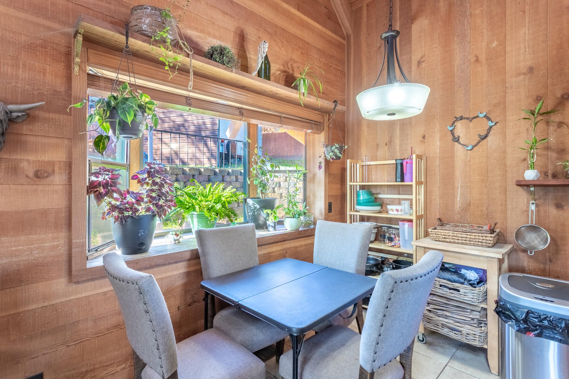 18376 Utility Avenue Anderson, CA 96007 - Photo 9 of 44 a view of a dining room with furniture window and wooden floor