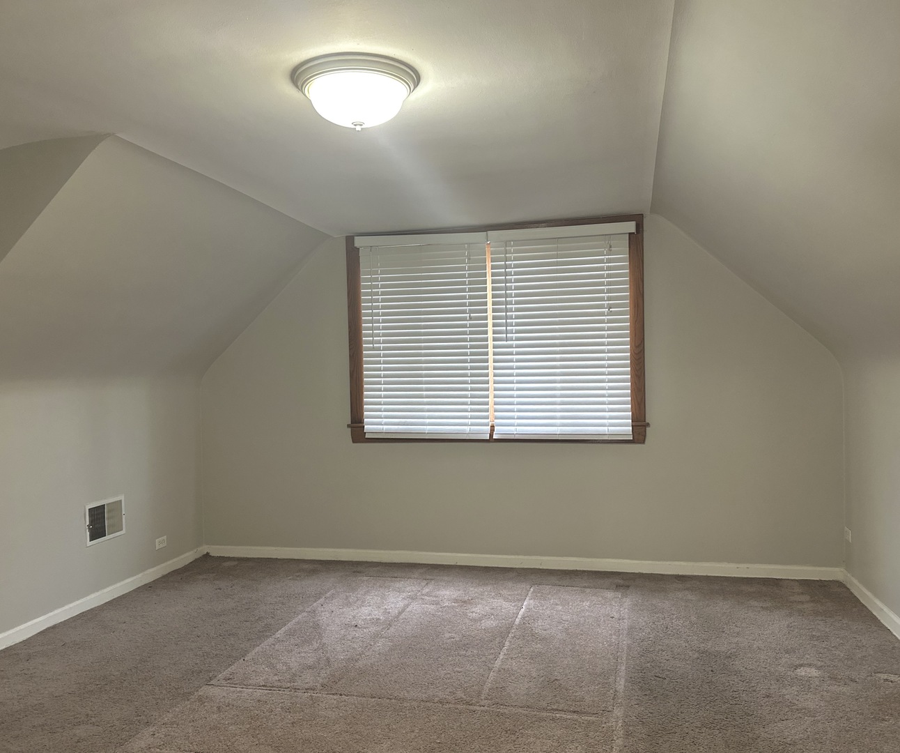18453 Clyde Road Homewood, IL 60430 - Photo 11 of 15 an empty room with a window