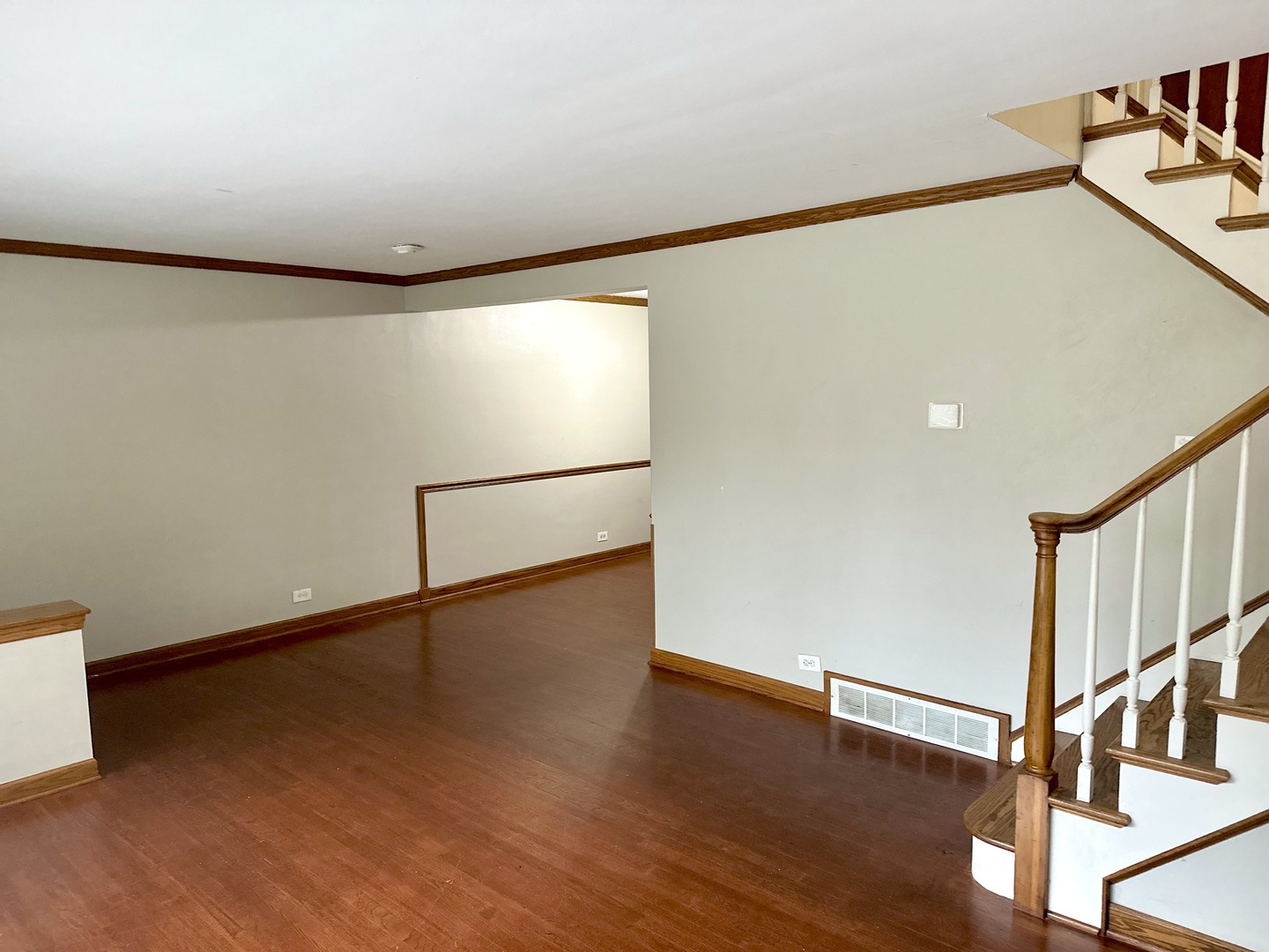 18453 Clyde Road Homewood, IL 60430 - Photo 4 of 15 a view of an empty room with wooden floor