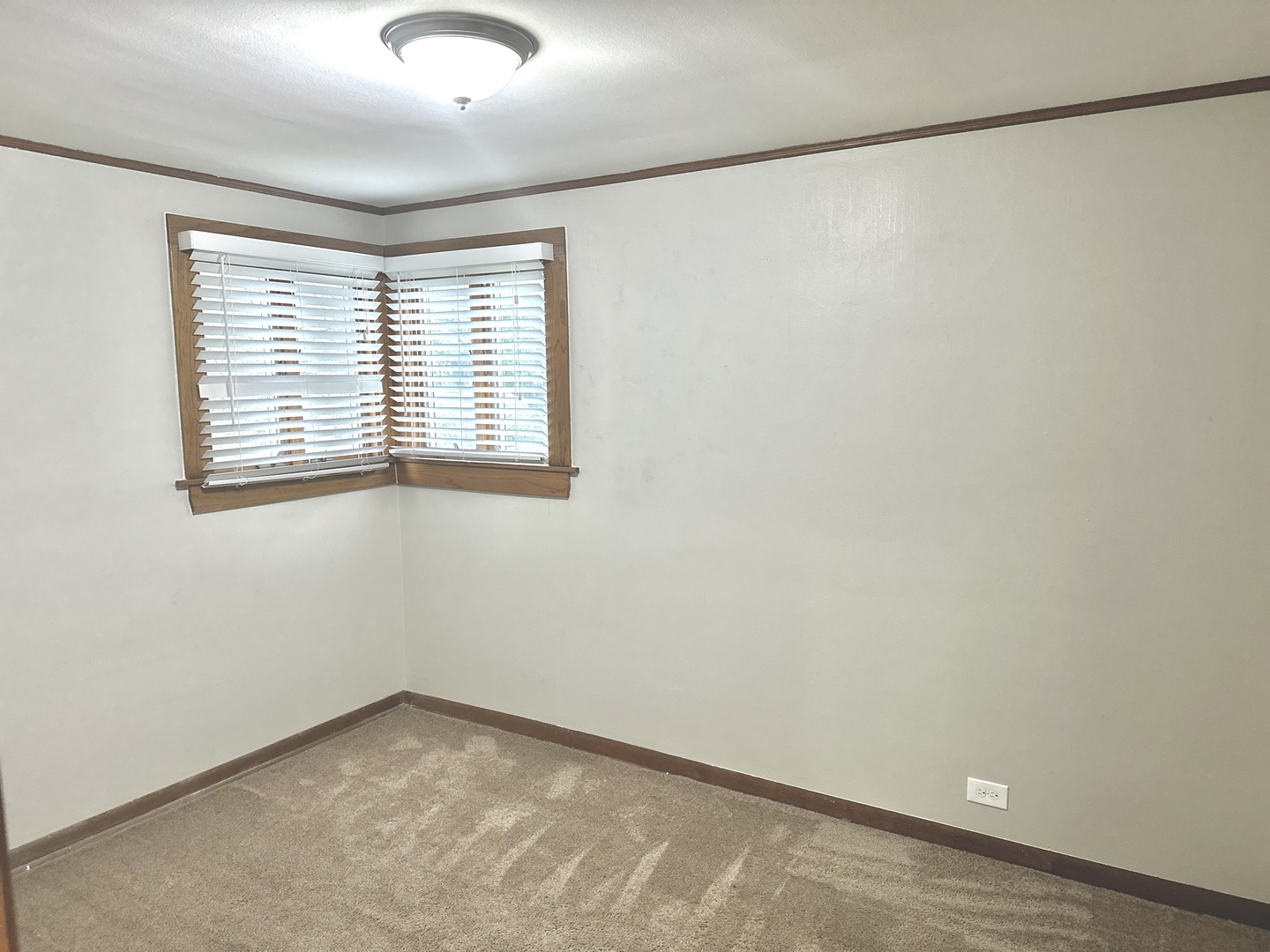 18453 Clyde Road Homewood, IL 60430 - Photo 9 of 15 a view of an empty room with a window