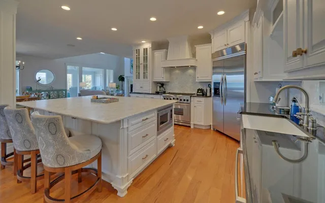 a bathroom with a sink double vanity and a mirror