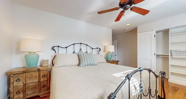 a bed room with furniture and a window