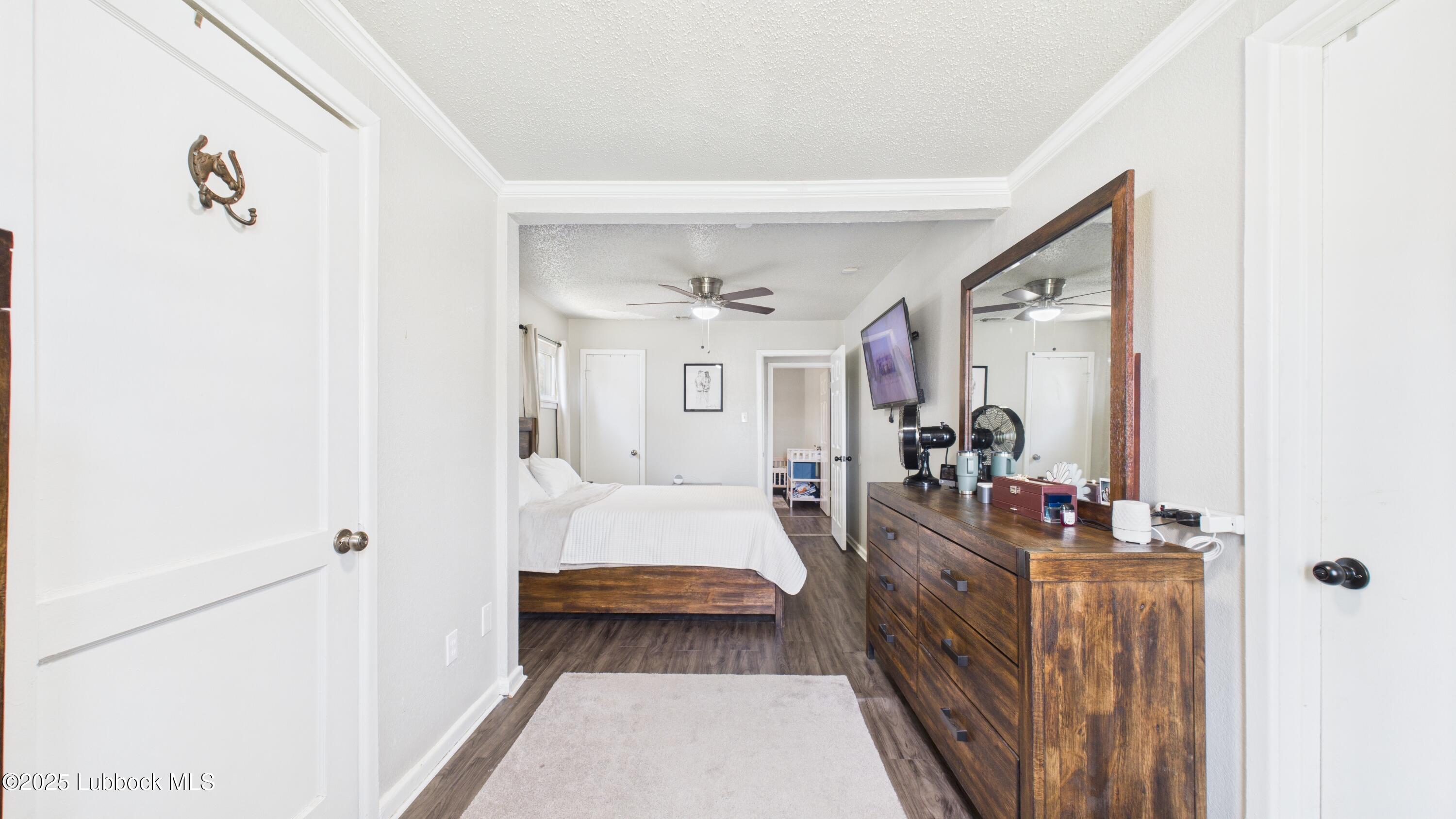 5310 24th Street Lubbock, TX 79407 - Photo 19 of 34 a view of a bedroom from hallway