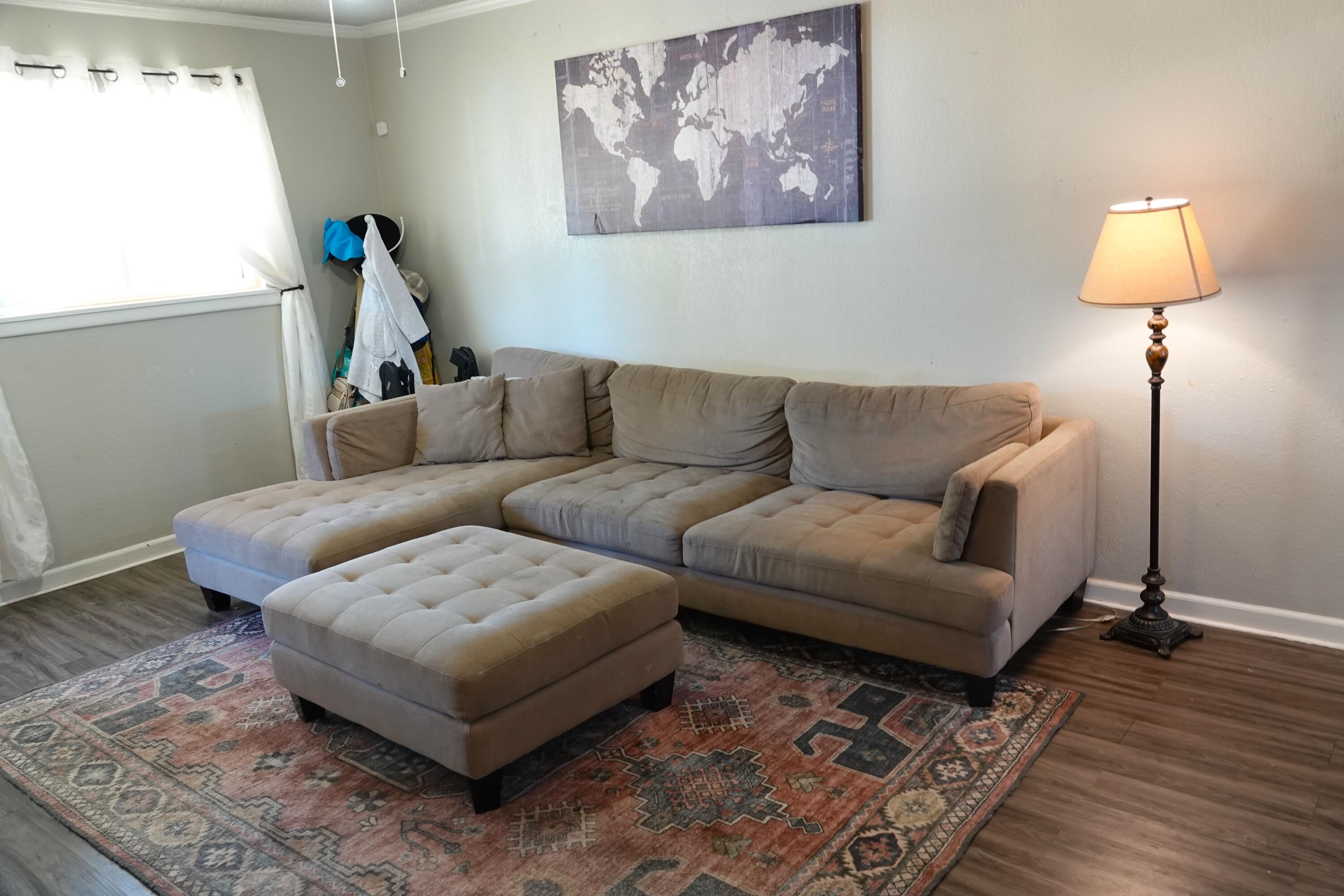 5310 24th Street Lubbock, TX 79407 - Photo 4 of 34 a living room with furniture and a window