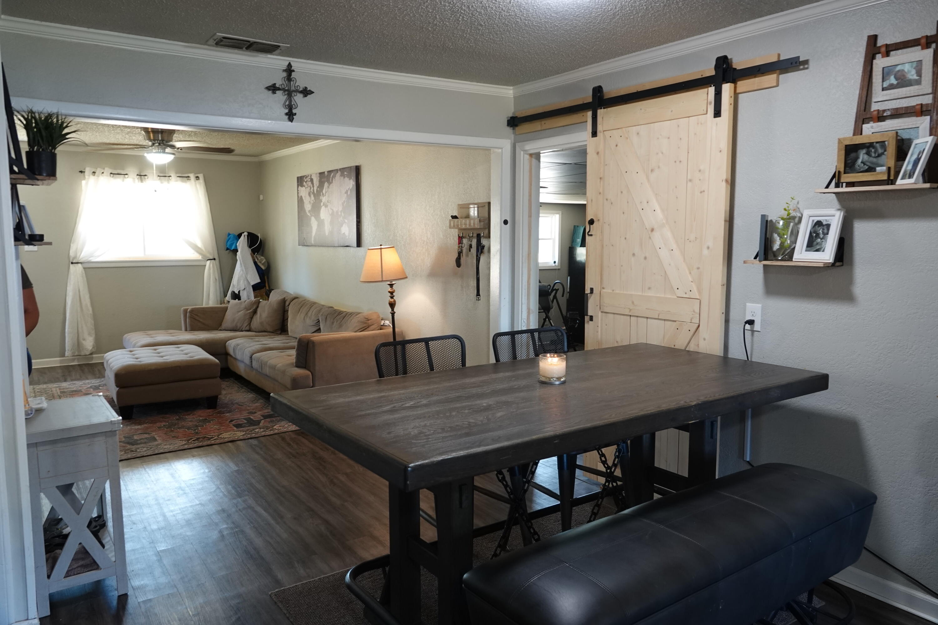 5310 24th Street Lubbock, TX 79407 - Photo 7 of 34 a view of a dining room with furniture and a table