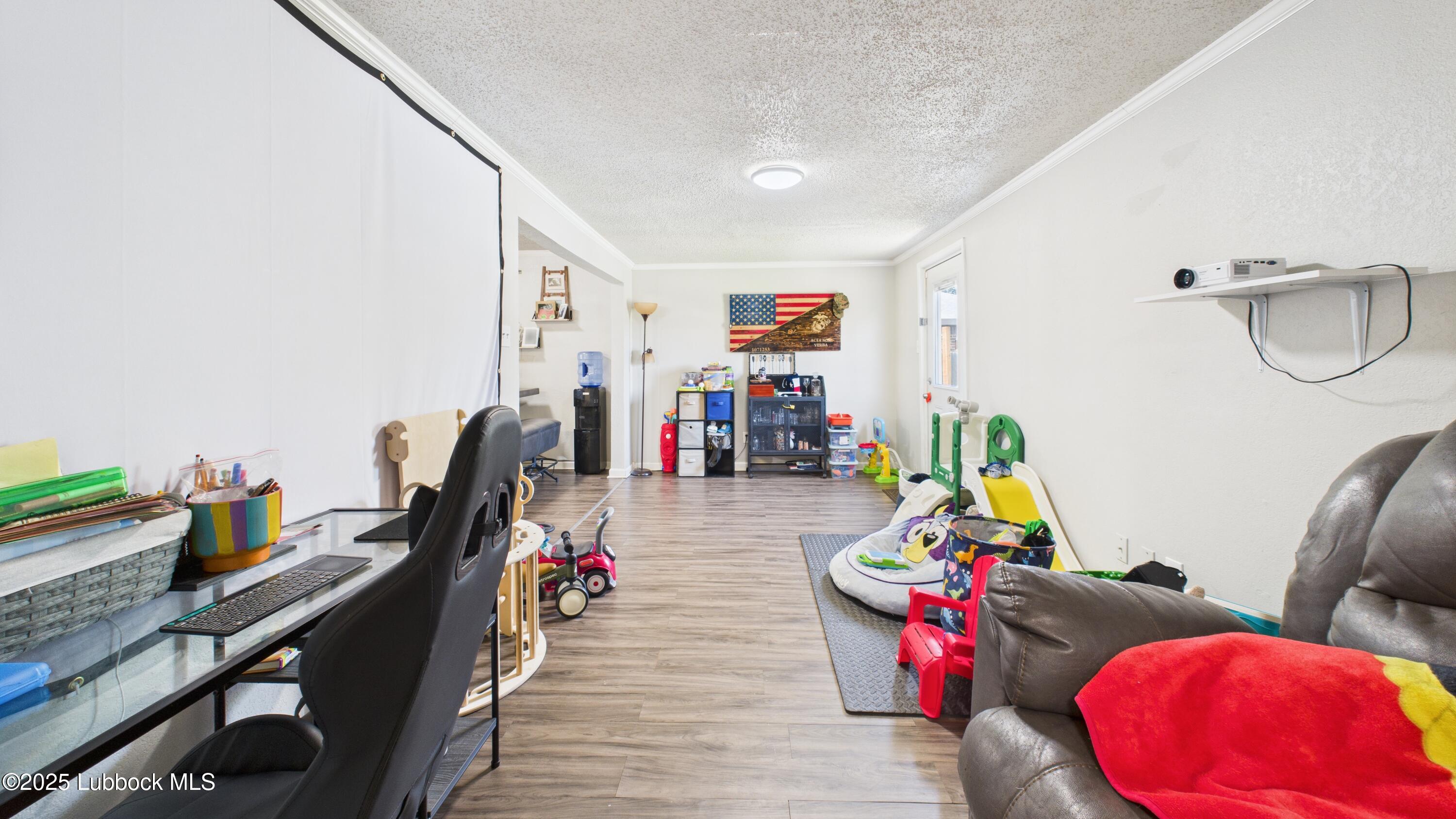 5310 24th Street Lubbock, TX 79407 - Photo 8 of 34 a view of a room with gym equipment