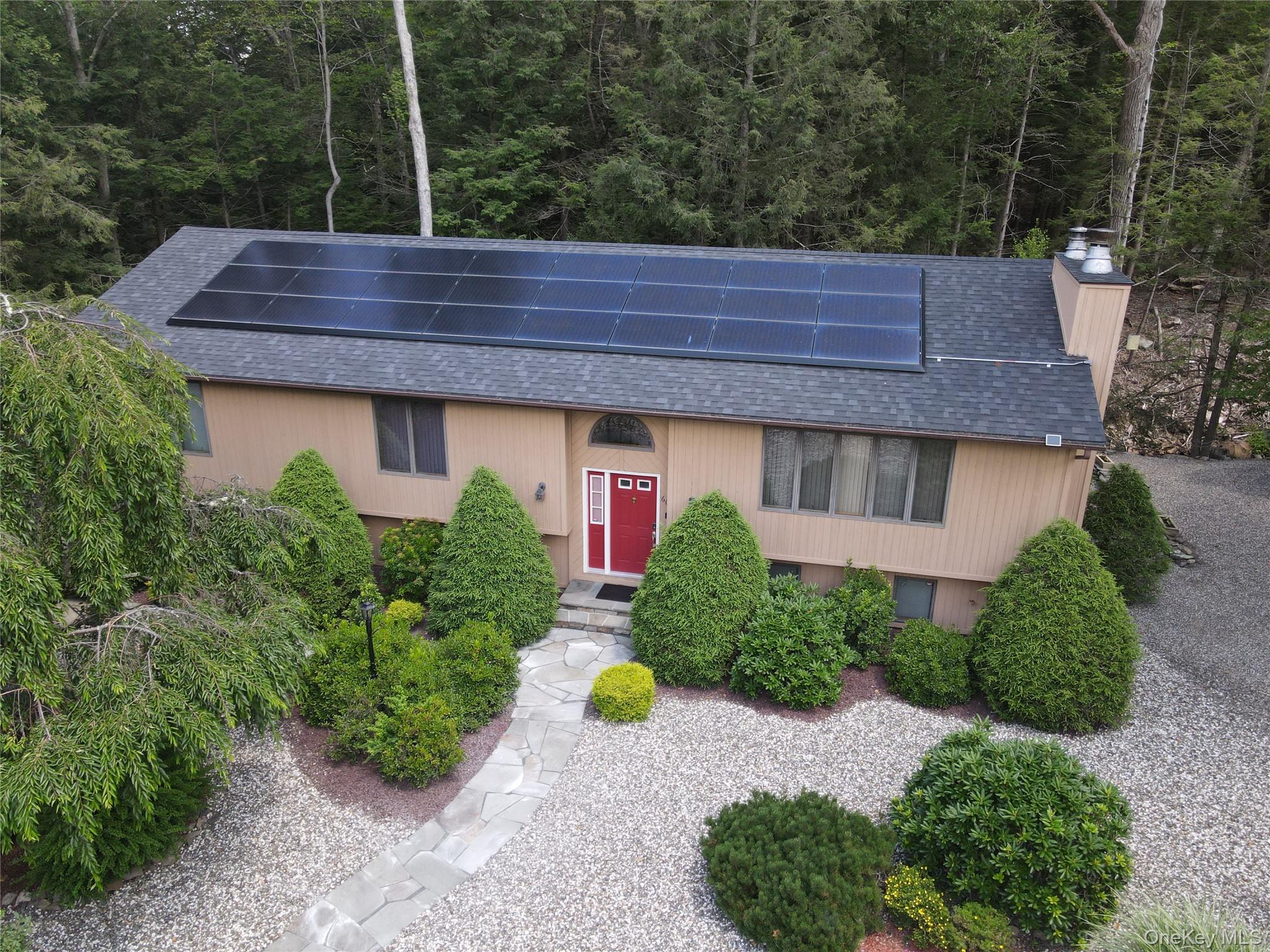 60 Manchester Road Rock Hill, NY 12775 - Photo 2 of 47 a aerial view of a house with a yard