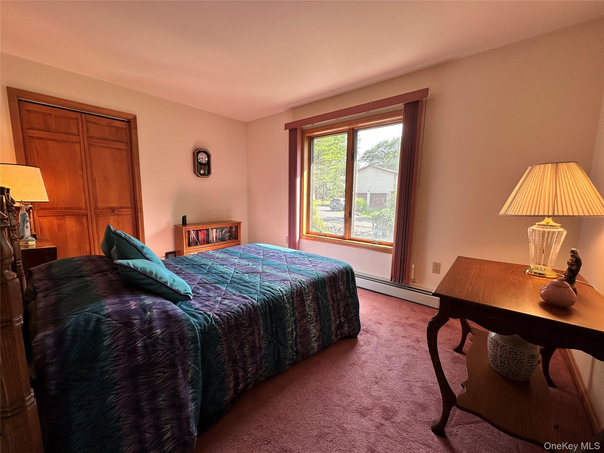 60 Manchester Road Rock Hill, NY 12775 - Photo 24 of 47 a bedroom with a bed window and a desk