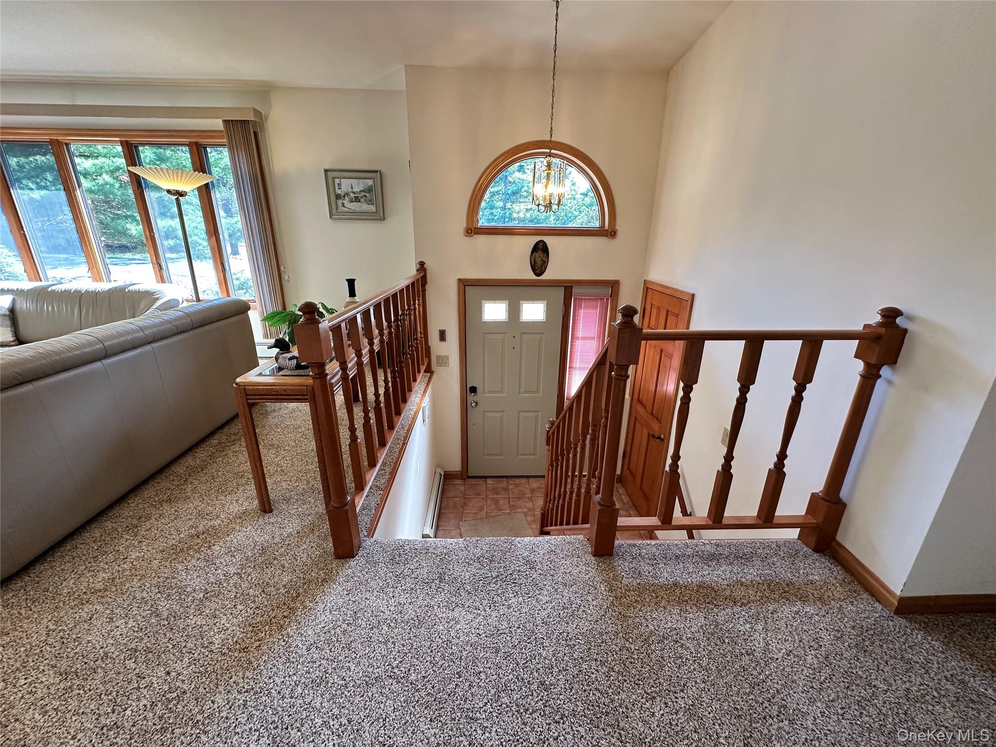 60 Manchester Road Rock Hill, NY 12775 - Photo 3 of 47 a view of a livingroom with furniture and stairs