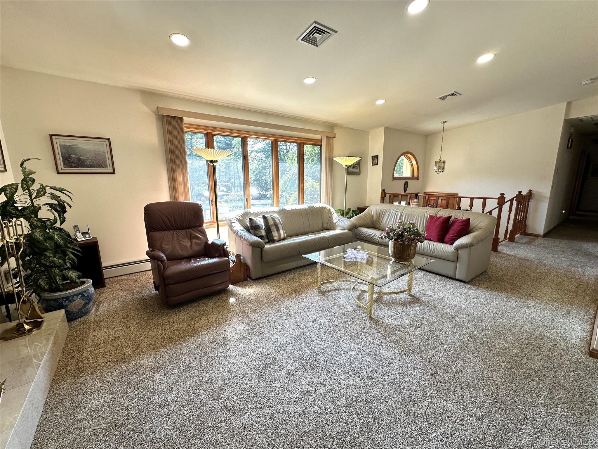60 Manchester Road Rock Hill, NY 12775 - Photo 6 of 47 a living room with furniture and a flat screen tv