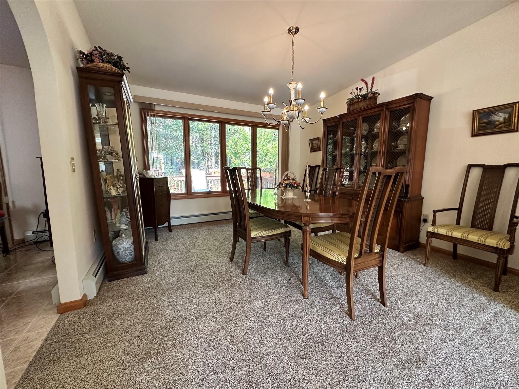 60 Manchester Road Rock Hill, NY 12775 - Photo 7 of 47 a view of a dining room with furniture window and outside view