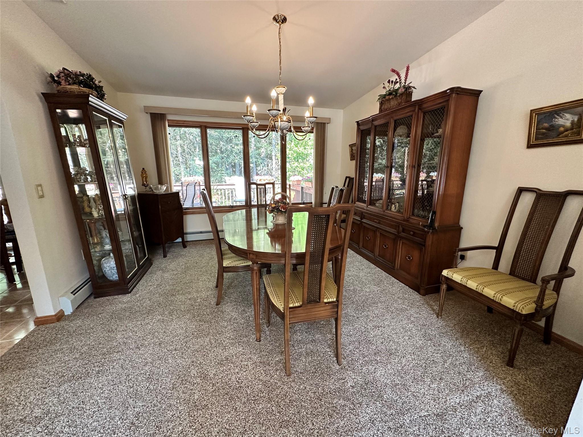 60 Manchester Road Rock Hill, NY 12775 - Photo 8 of 47 a view of a livingroom with furniture window and wooden floor