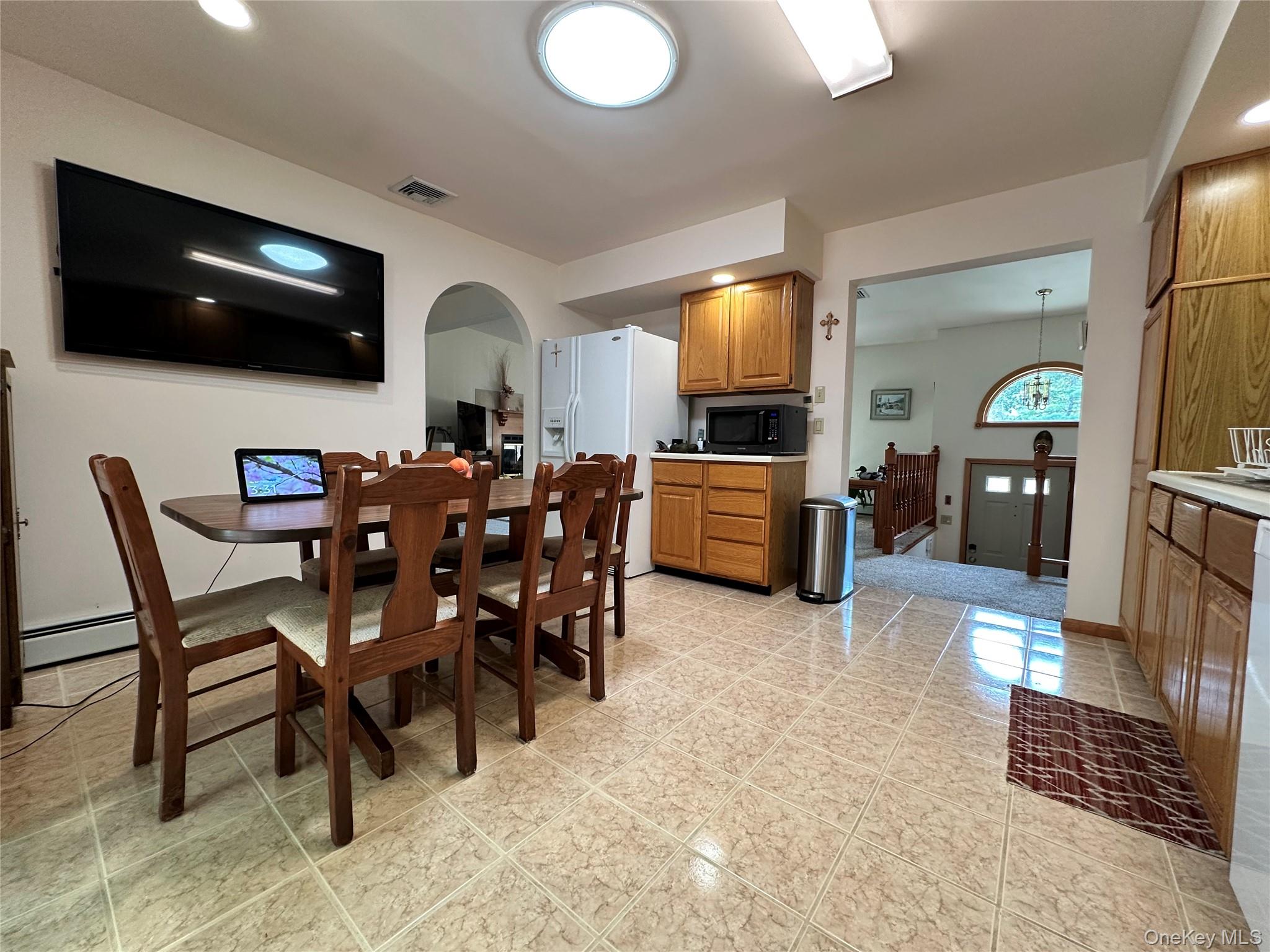 60 Manchester Road Rock Hill, NY 12775 - Photo 10 of 47 a view of a livingroom with furniture and a flat screen tv