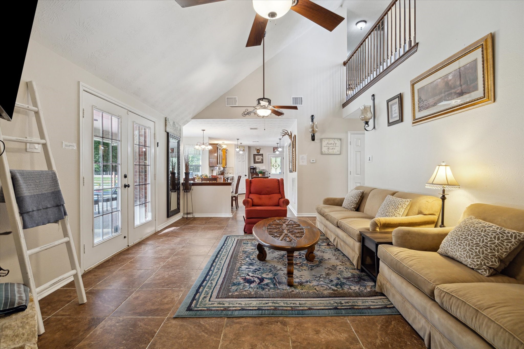 19215 Veterans Road Magnolia, TX 77355 - Photo 13 of 50 a living room with furniture and a rug