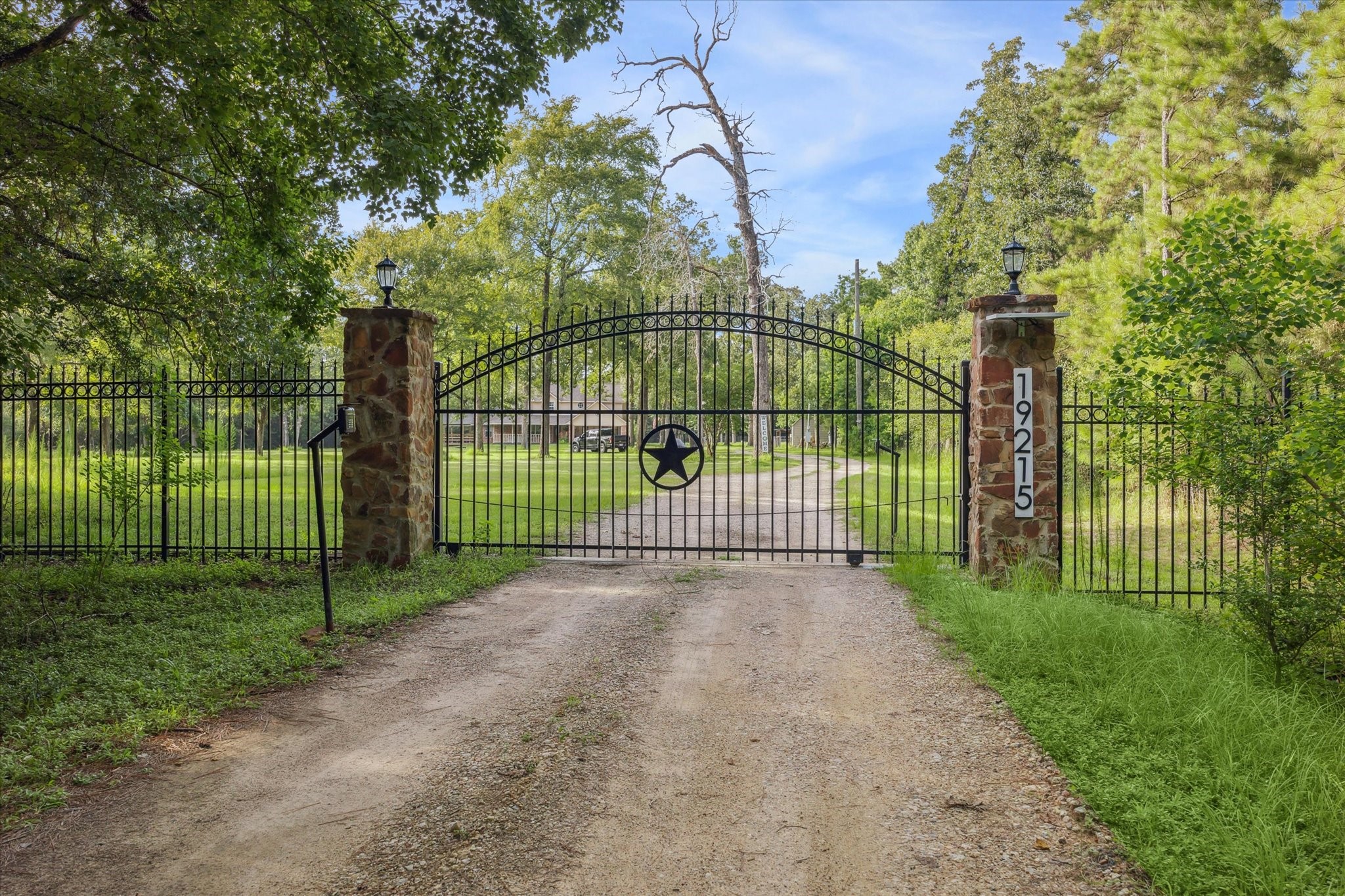 19215 Veterans Road Magnolia, TX 77355 - Photo 4 of 50 a view of a yard and basketball court