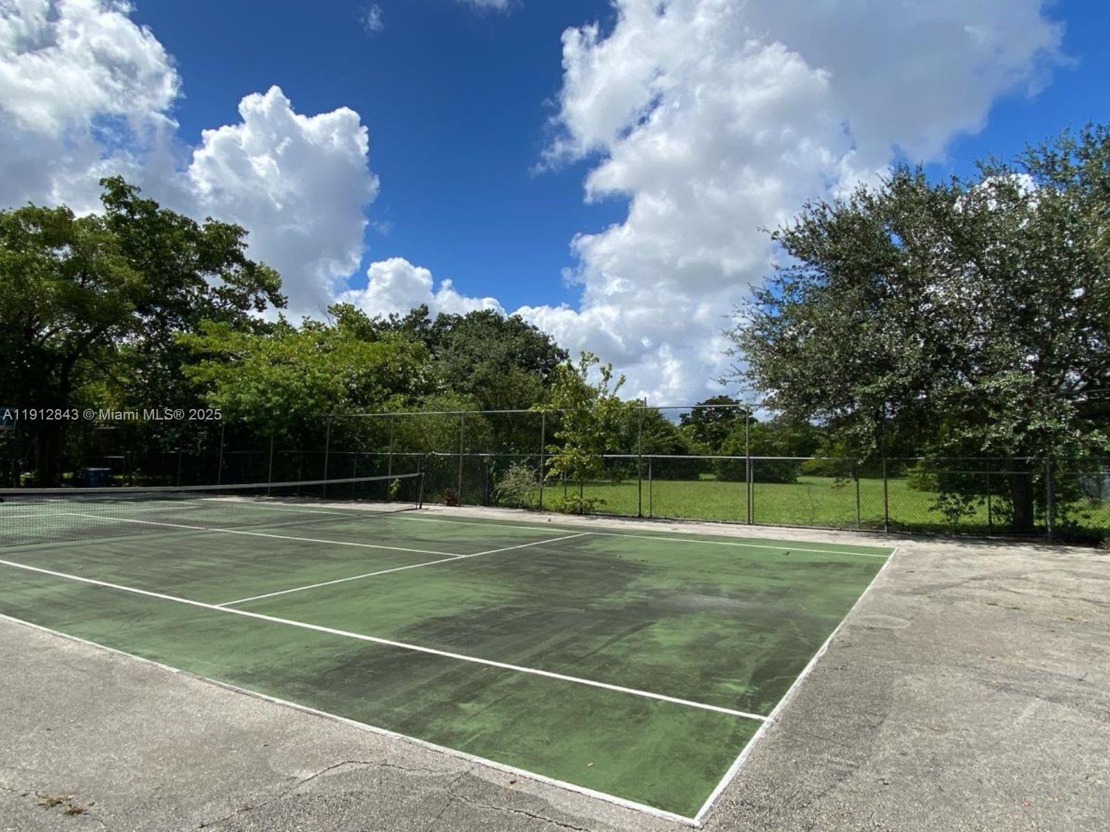 3282 North Pine Island Road, Unit 301 Sunrise, FL 33351 - Photo 25 of 25 a view of a tennis court