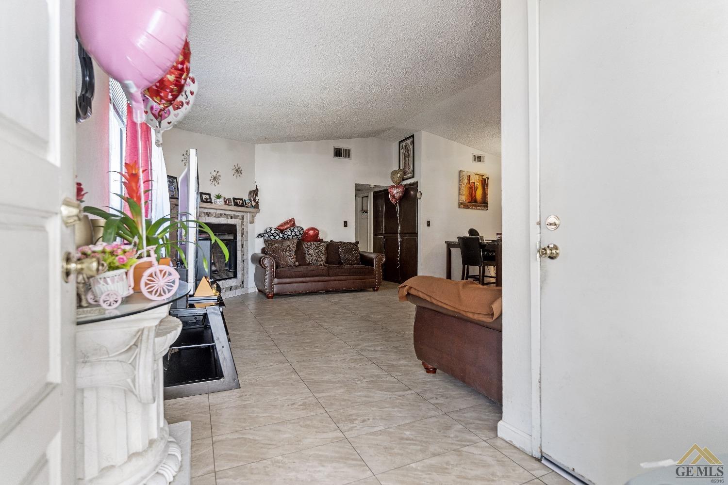 Undisclosed Address Bakersfield, CA 93304 - Photo 5 of 19 a view of a room with gym equipment